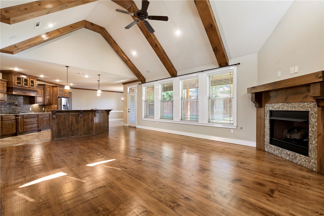 Cross Creek, European Brick and cedar 2 story home, 4 bedrooms 3 full baths with heated master bath floors. Master Bathroom was remodeled in 2022. Covered Patio with fireplace & gas grill for entertaining family & friends. Cozy up in front of the living room fireplace. Host a large group in this amazing kitchen & large island. Cooking is easy with double ovens, gas stovetop & granite countertops. Vaulted ceiling and wood beams, bonus room features a wet bar and beverage cooler. Community amenities include spacious walking trails, athletic fields & courts, private pool and playground, and several neighborhood events throughout the year. Coveted neighborhood in perfect central location only five minutes from Pinnacle, walking distance to exceptionally rated Janie Darr Elementary, & walking distance to brand new Mt. Hebron Park. Upgrades throughout the home include newly updated kitchen appliances, Next system, surround sound system, & oversized garage. New paint & newly refurbished authentic hardwood floors in 2022.