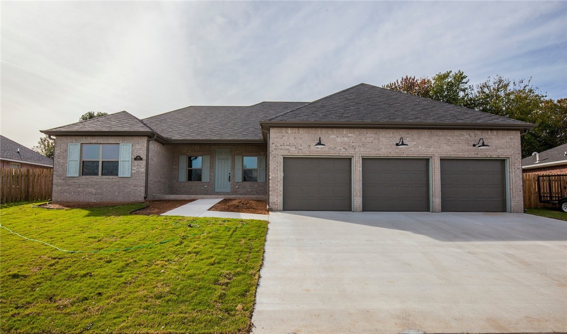Beautiful home in Lowell. Great open floor plan, vinyl plank wood style flooring throughout home. Gas fire place in living room with custom tile, Granite counters, Stainless appliances, many upgrades, surround sound in living room, split floor plan, 3 car garage, fenced yard, covered patio area.