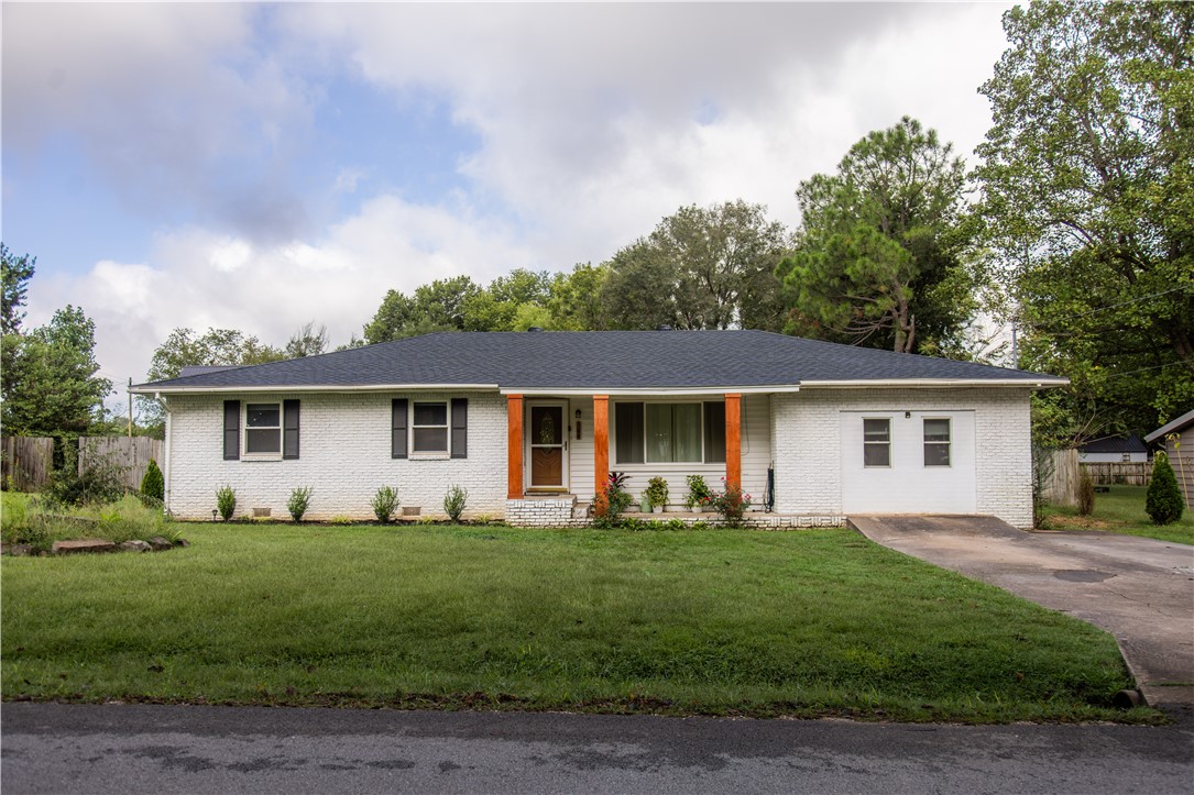 This home is all buttoned up and ready for its new owners! The home and lot are so spacious! The cohesive layout boasts a centeral kitchen, dining, living area and split bedroom layout. There is a large bonus room that can be used as a primary bedroom with ensuite half bath or a bonus room. This lot is spacious, partially shaded, and great for life and entertaining.The roof is new this year. Prairie Grove is a small town packed Big amenities. The home is an easy distance to the historic downtown, restaurants, grocery store, and parks.
