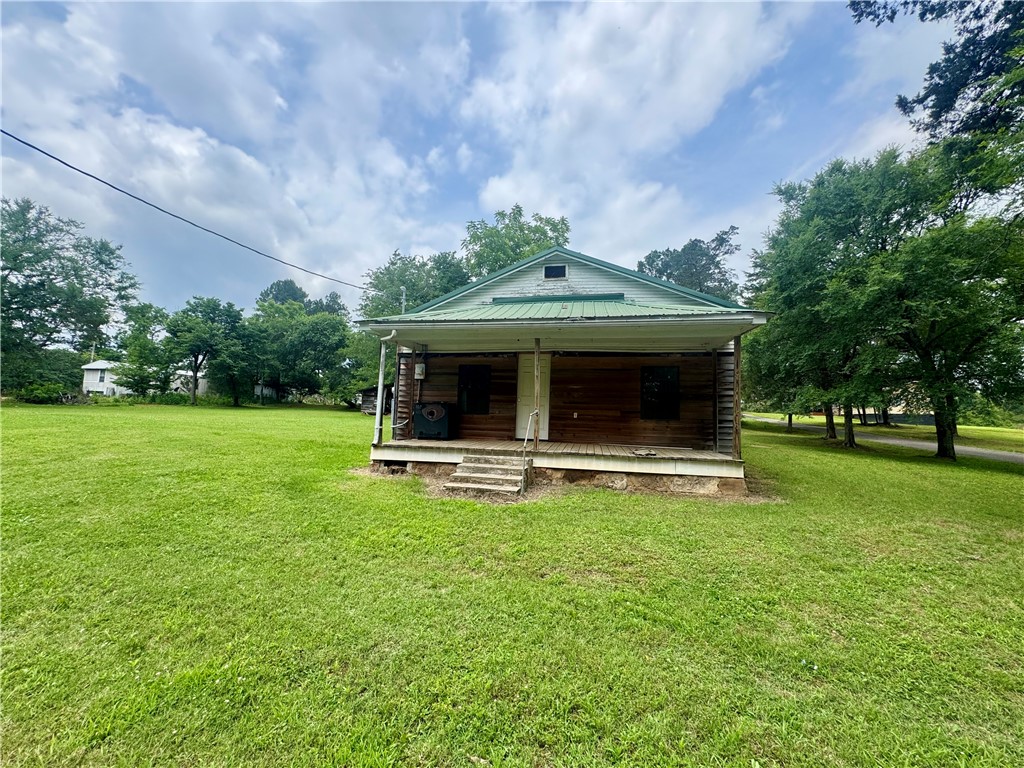 Investor special with great potential! This 2-bedroom, 1-bath home is a prime opportunity for a flip, rental property, or an Airbnb. Nestled on a spacious corner lot in the country, it's ready for you to bring your vision to life and make it something special. Located just a mile from the Ozark National Forest, you'll have easy access to riding trails and endless outdoor adventures. Easy to showāschedule your tour today!