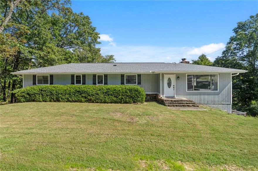 Welcome home to this well-maintained split-level residence offering a spacious, open living and dining area with easy access to the deck—perfect for relaxing or entertaining. The upper level includes two full bathrooms, while the walk-out basement provides an additional living area, a versatile extra bedroom or flex space, and another full bath. 

Take advantage of local favorites like Lake Avalon’s sandy beach and the scenic Tanyard Creek Nature Trail, or explore Bella Vista’s abundance of recreation options. Enjoy access to seven picturesque golf courses, seven private lakes ideal for boating and fishing, and an extensive trail network featuring the Back 40 and Little Sugar Trails. Multiple recreation centers offer fitness facilities, indoor pools, and courts for tennis and pickleball. Residents also enjoy parks, playgrounds, community events, and a wealth of outdoor activities—all surrounded by the natural beauty of the Ozarks.