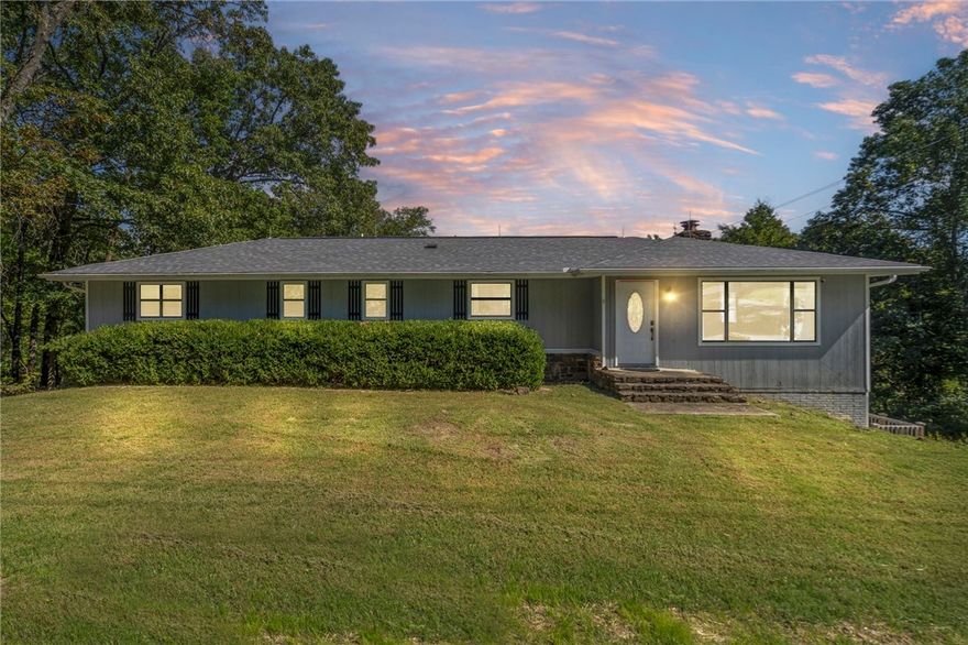 Welcome home to this well-maintained split-level residence offering a spacious, open living and dining area with easy access to the deck—perfect for relaxing or entertaining. The upper level includes two full bathrooms, while the walk-out basement provides an additional living area, a versatile extra bedroom or flex space, and another full bath. The adjoining lot ensures lasting privacy and a peaceful setting.

Take advantage of local favorites like Lake Avalon’s sandy beach and the scenic Tanyard Creek Nature Trail, or explore Bella Vista’s abundance of recreation options. Enjoy access to seven picturesque golf courses, seven private lakes ideal for boating and fishing, and an extensive trail network featuring the Back 40 and Little Sugar Trails. Multiple recreation centers offer fitness facilities, indoor pools, and courts for tennis and pickleball. Residents also enjoy parks, playgrounds, community events, and a wealth of outdoor activities—all surrounded by the natural beauty of the Ozarks.