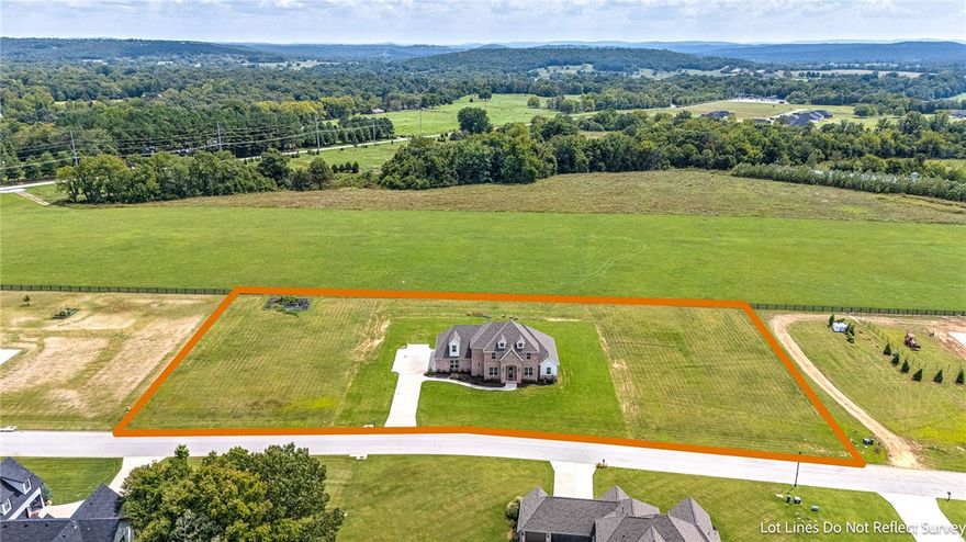 This spacious 4-bedroom, 3-bathroom which includes a bonus room +an office is situated on a generous 1.98-acre lot, offering stunning views of the surrounding open space. The property provides ample room for outdoor activities, gardening, or simply enjoying the natural beauty that surrounds it. With its expansive layout and serene setting, this residence offers a perfect blend of comfort, privacy, & connection to nature. Built in 2021, the home harmonizes contemporary design with thoughtful features. The kitchen is a culinary haven with quartz countertops, a large island, double oven, gas cooktop, & a convenient pot filler. Have your morning coffee or breakfast looking out your double picture windows in your eat-in kitchen. Retreat to the primary bathroom, where a vessel tub awaits. Hardwood floors add warmth & sophistication to the interiors. This property is a carefully curated retreat where modern design meets the tranquility of its natural surroundings, ensuring a life of comfort and refinement.