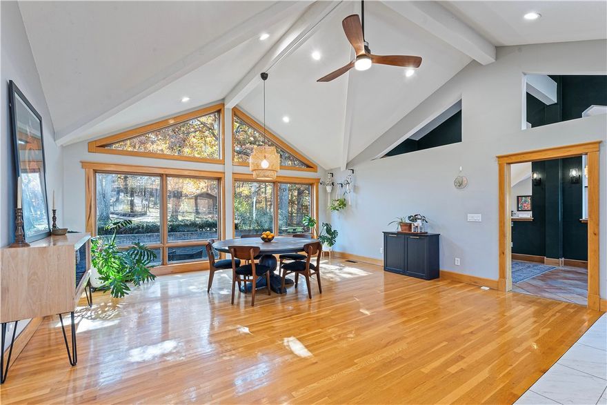 NEW PRICE + NEW OPPORTUNITY! Set on nearly 30 rolling acres just outside Rogers, this modern architectural retreat captures sweeping Ozark Mountain views and an unmatched sense of privacy. Clean lines, bold geometry, and expansive glass create a light-filled home that feels both elevated and deeply connected to nature. The main level impresses with a gourmet kitchen, cathedral ceilings, and two spacious living areas perfect for gatherings. A lower-level in-law suite with private entrance offers ideal flexibility for guests, rental, or multi-gen living. Enjoy true dark-sky nights—stargaze by the fire or watch vibrant sunsets from the large deck overlooking a tranquil valley. Property includes fenced lawn, gardens, a detached workshop, and 4-car garage. Multiple build sites give room to expand your vision. Minutes to Hobbs State Park, Beaver Lake, Monte Ne Boat Ramp, and Prairie Creek Marina. A rare blend of design, serenity, and adventure—your modern Ozark escape awaits. Book your exclusive showing today!