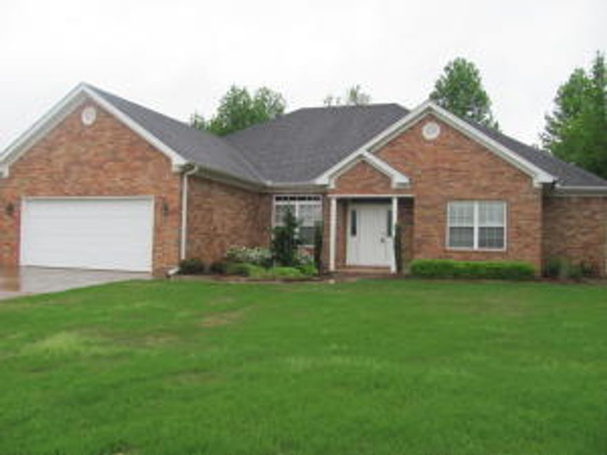 Possible Owner Financing......Beautiful Cove Landing home in a nice cul-de-sac with 4 bedrooms, a formal dining room, large living room with fireplace, and a spacious master suite with walk in shower and jetted tub.  There is new paint and carpet throughout! The fenced back yard, patio, and lovely landscaping add exterior appeal to this gorgeous home!