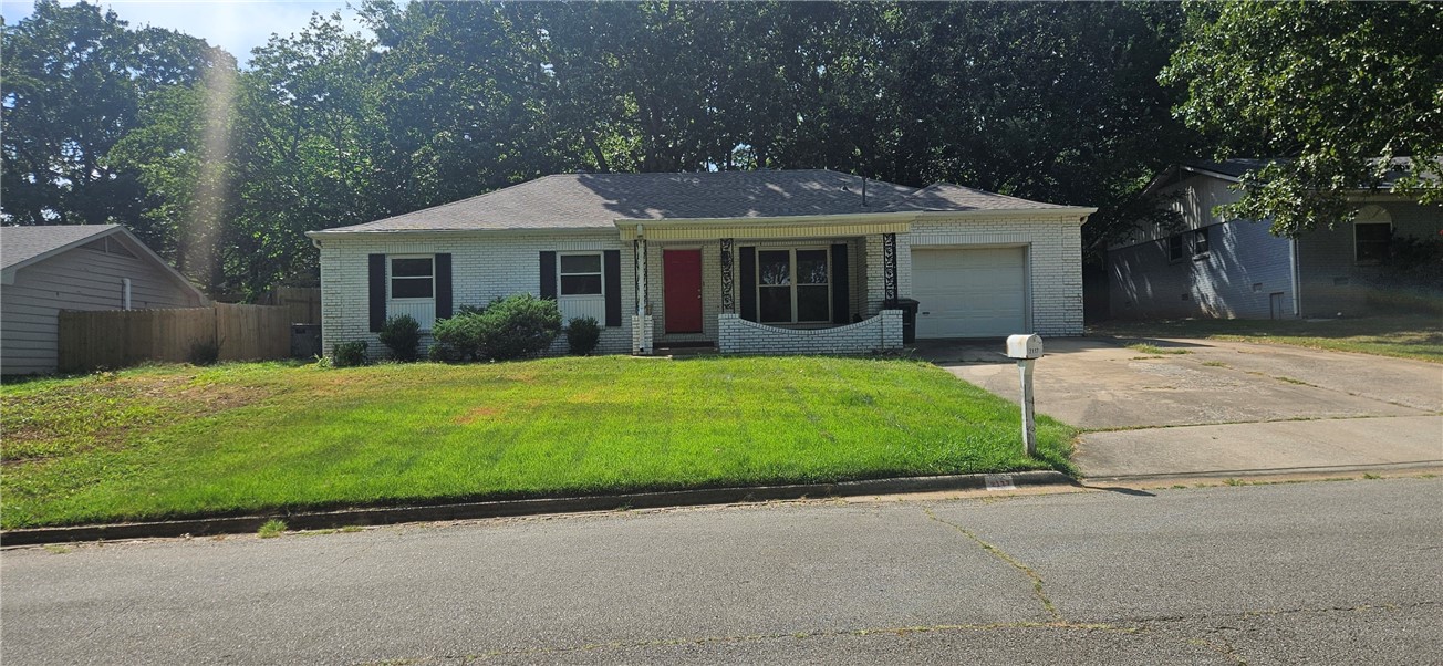 Nice home in E Fayetteville close to everything. Home features 3 bedrooms, 2 bathrooms, 1 car garage, & wood floors throughtout. Home has 2 living areas, eat in kitchen, breakast bar, gas log/wood burning fireplace in main living room. Huge fenced in back yard and back patio for entertaining with all appliances included. Wont last long. $1595 a month or $1695 with lawn care included.
