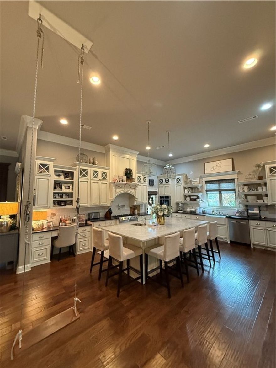 Beautiful custom built home in Thornbury Subdivision. Lovely in-ground pool on a large .48 acre lot. Home features 5 bedrooms and a bonus room over the garage.