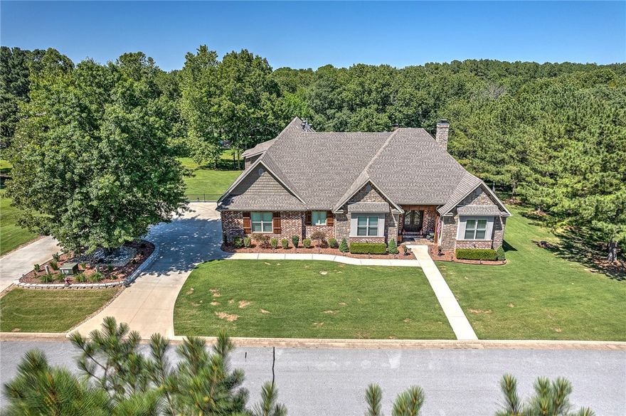 Amazing custom build home in 2018, 1/4 mile to Horseshoe bend state park Boat Ramp. 4 Bed and 4 FULL Bath. Screened/Plexiglas sunroom with air/heat (included in square footage) 1.39 Acres with mature trees. 2 added storage spaces in crawl space with 1 dehumidifier to convey to keep it dry. Upstairs bonus/4th bed is insulated for sound.  Wood storage in built in cabinet to left of woodstove. Extra fridge in garage to convey. All windows have plantation blinds. Lots of floored attic space for easy access. Wood look tile floors throughout main floor. Built in outdoor kitchen in sunroom with vent hood over grill and mini fridge. Massive outdoor deck overlooking this beautiful yard.  Porch Swings under deck to watch all the deer in the evening.  Absolutely a dream home.