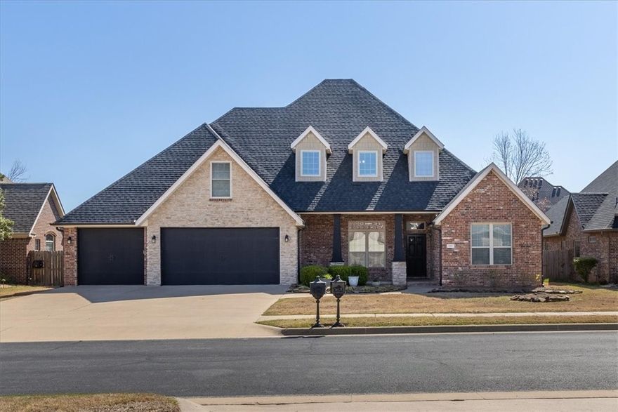 Only 5 min to the Walmart Campus from your new Executive home. Custom finishes include Cathedral ceilings, a stunning stone fireplace, impeccable woodwork, new flooring downstairs, updated Jack-in-Jill bathrooms. Chefs will love the gas range & double ovens. Master is on the main floor w/ lovely high-end touches. This split floor plan also boasts two large bedrooms w/ connected bath, & your office, which can be a 5th bedroom if needed. Behind the hidden door to your upstairs, you'll find a substantial bonus room, & another bedroom w/ full bath. Oversized 3-car garage w/ NEW poxy floor, ample storage & 9ft doors. Your low maintenance backyard is an oasis with 2 pergolas, multiple sitting areas, & wired for BOSE sound. Relax in your powerful 8 -person Thermaspa Hot Tub w/ 120 jets! Don't miss the massive 15 KW solar that nearly knocks out your electric bill, & 12x18 outdoor workshop! New roof in '23. New A/C in '21. New dishwasher '23. Up to $10,000 offered for closing costs, home warranty, upstairs carpet, etc.