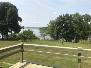 Amazing lake view from this two bedroom home! Bull Shoals Lake is literally out your back door. Home needs some TLC but you can customizeto your likings. Property is located on a boat dock approved area. Price to sell!!