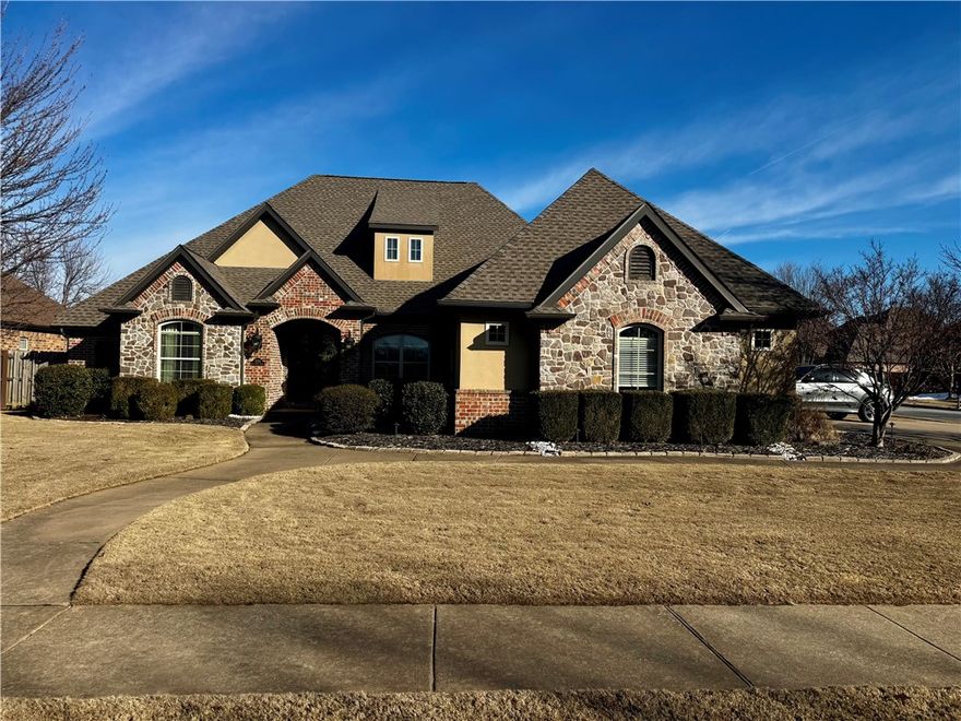 This fantastic executive home is one of the most desirable neighborhoods in Rogers.  It has several wonderful features and recently gone through extensive remodeling to include the kitchen, dining, bathrooms, primary level flooring, lighting, ceiling fans, trim, crown molding. Built-in Kitchen Aid appliances and 3 cm quartz countertops , full quartz backsplash and Brizo Faucet highlight the kitchen remodel.  Primary bath is remodeled end to end and features a beautiful soaking tub.  This home also features a large theater/entertaining room.  With plenty of storage, great floor plan, up to date and a smart home, this home move-in ready.