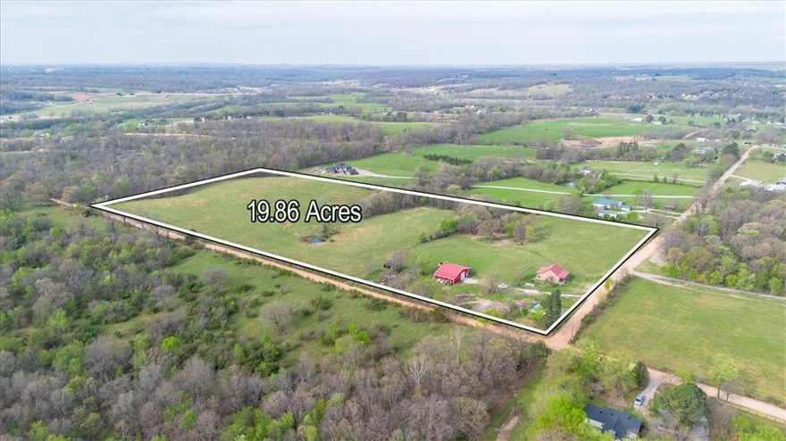 Discover the perfect blend of modern style and working farm utility on 19.86 pristine pasture acres. This stunning farmhouse, completely remodeled in 2018, offers timeless character with the peace of mind of new construction.
The property features a versatile 40x60 shop structure, boasting a 40x40 enclosed interior with a 14ft automatic door—ideal for an RV, boat, or professional workshop. The remaining footprint provides a deep integrated overhang for sheltered equipment storage. Reliability is built-in with two wells, including one installed within the last year to support the home and land.
Perfectly positioned near Cave Springs, the world-class amenities of Bentonville, and the convenience of XNA, this estate offers the quiet life without sacrificing accessibility. Whether you’re raising livestock or seeking a private retreat, this is a rare find in NWA. Experience the freedom of the farm with all the modern comforts you crave.