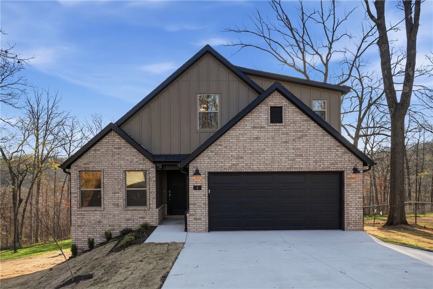 $5,000 IN BUYER CONCESSIONS! Additional builder preferred lender credit available.
This new construction two-level home offers 3 bedrooms with walk-in closets, an office, and 2.5 bathrooms. The open-concept kitchen, dining, and living area includes a fireplace and is designed for modern living and functionality. The kitchen is equipped with 3 cm granite countertops and a Frigidaire Gallery appliance package. Additional features include LED disk lighting throughout, full aluminum guttering, and a 2-car garage.

Located in a convenient Bella Vista location close to trails, golf, recreation, shopping, and all that Northwest Arkansas has to offer. This home combines quality construction, a practical layout, and stylish finishes—ideal for buyers seeking comfort and convenience.