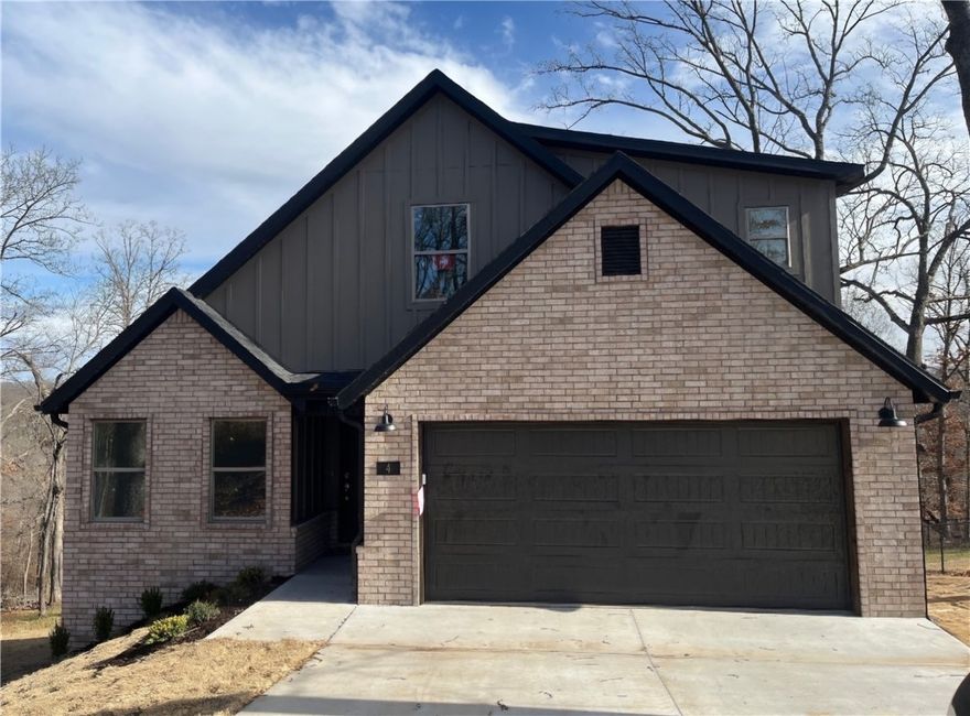 This new construction two-level home offers 3 bedrooms with walk-in closets, an office, and 2.5 bathrooms. The open-concept kitchen, dining, and living area includes a fireplace and is designed for modern living and functionality. The kitchen is equipped with 3 cm granite countertops and a Frigidaire Gallery appliance package. Additional features include LED disk lighting throughout, full aluminum guttering, and a 2-car garage.

Located in a convenient Bella Vista location close to trails, golf, recreation, shopping, and all that Northwest Arkansas has to offer. This home combines quality construction, a practical layout, and stylish finishes—ideal for buyers seeking comfort and convenience.