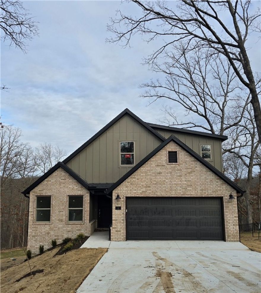 This new construction two-level home offers 3 bedrooms with walk-in closets, an office, and 2.5 bathrooms. The open-concept kitchen, dining, and living area includes a fireplace and is designed for modern living and functionality. The kitchen is equipped with 3 cm granite countertops and a Frigidaire Gallery appliance package. Additional features include LED disk lighting throughout, full aluminum guttering, and a 2-car garage.

Located in a convenient Bella Vista location close to trails, golf, recreation, shopping, and all that Northwest Arkansas has to offer. This home combines quality construction, a practical layout, and stylish finishes—ideal for buyers seeking comfort and convenience.