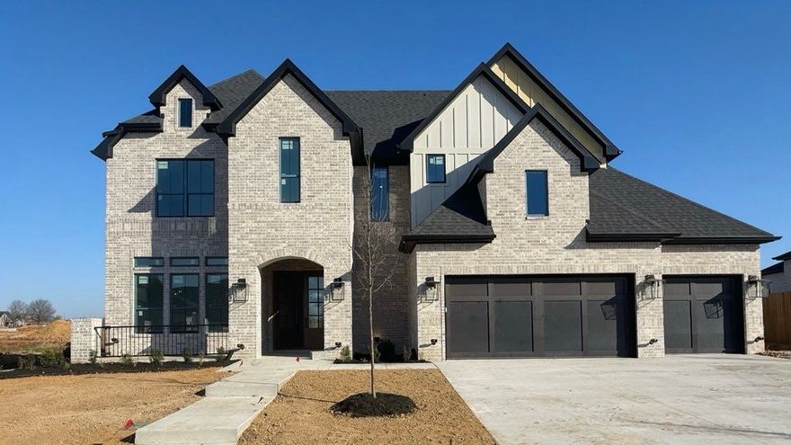 The Monroe is a two-story estate plan filled with natural light. The home features double front doors leading into a welcoming living room with direct access to the outdoor patio. The open layout includes a kitchen with a large island that offers additional seating, a breakfast nook, and a walk-in pantry. The owner’s suite is located at the back of the home with a walk-in closet and a bathroom that includes a freestanding tub. Also on the first floor are a secondary bedroom and full bath, along with a three-car garage connected to the utility room. Upstairs, you’ll find a media room, three bedrooms, and two additional bathrooms, along with a catwalk overlooking the two-story foyer.