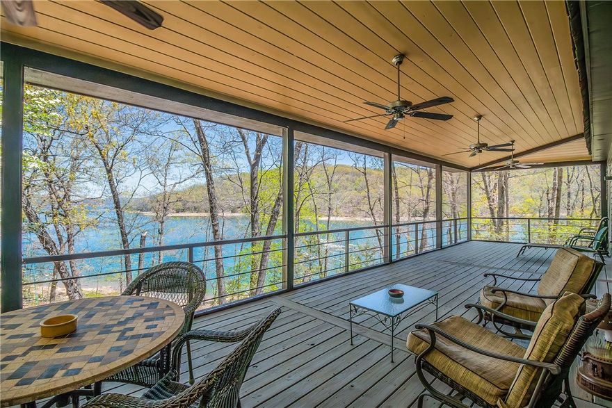 Private lakeshore retreat presides over 1.57 acres on Beaver Lake, offering a perfect vantage point of unparalleled lake views! Easy lake access, sandy pebble beaches, private cove, & close proximity to Starkey Marina, this offering is extraordinary. Beautifully restored 2-story w/2,683 SF of timeless elegance, featuring 3 BRS & 3.5 baths. Classic details such as intricate molding, wide plank pine floors, & vintage style fixtures adorn the interior, while seamlessly integrated updated appliances & amenities combine both charm & modern comfort. Main level primary suite boasts en-suite bath & walk-in closet w/custom built-in cabinetry. Upstairs w/2 additional guest BRS & spacious full bath. Lower level offers a fully finished basement featuring a bar, entertainment area, kitchenette, & full bath. Step outside to experience the envy of all screened-in porches, offering space for dining alfresco, entertaining & relaxing, while showcasing the breathtaking beauty of Beaver Lake. Also see 227 Marina Hts ML#1294932