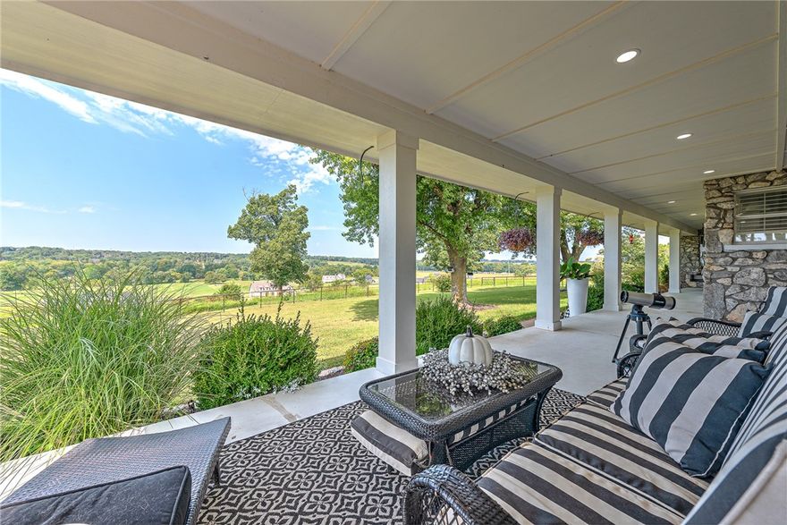 From the dreamy covered front porch, lose yourself in sweeping valley views that invite you to linger,
relax, and simply breathe. The perfect haven for morning coffee, quiet reflection, and witnessing some of
the most breathtaking sunrises in all of Northwest Arkansas.This one-of-a-kind property is located just 6
minutes from XNA Airport, 20 minutes to all the excitement of downtown Bentonville, & just 15
minutes from the Pinnacle Hills area, including Mercy Hospital, Pinnacle Hills Promenade, Walmart AMP,
trails, shopping & restaurants! This charming one-level ranch, with its timeless rock exterior & newly
refreshed 4 bed/2bath interior, perfectly blends character with comfort. The detached 3-car garage not
only offers ample storage and workshop space, but also the opportunity to design a welcoming in-law
suite. Don’t miss your chance to experience one of the most sought-after areas in NWA
where peaceful country living meets the convenience of being close to everything the region has to offer.