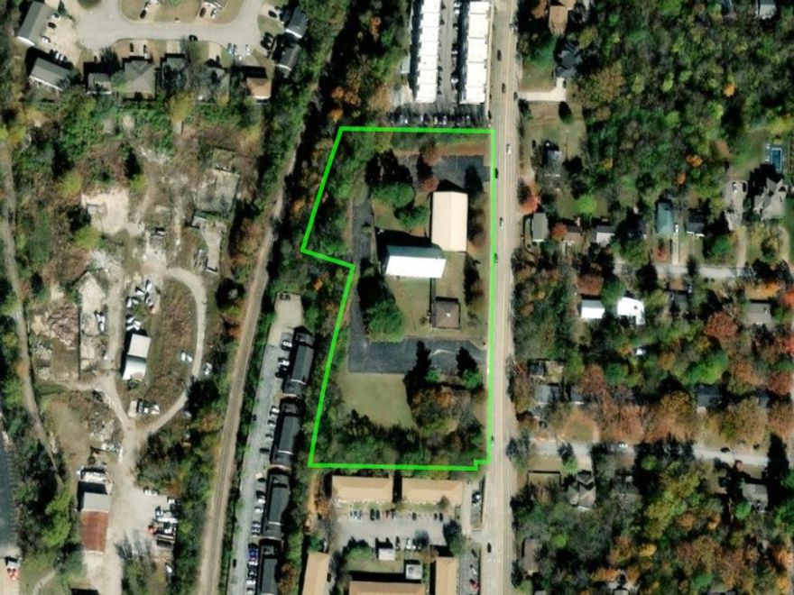RMF40 LAND! 4.5 acres ready to develop or use the current home, office building, and church building for your needs. The city of Fayetteville has already approved a large apartment development.  Prime land close to the trail, the University is less than a mile away. Perfect for attracting students. Central Fayetteville location makes this land valuable for anything you'd like to develop.