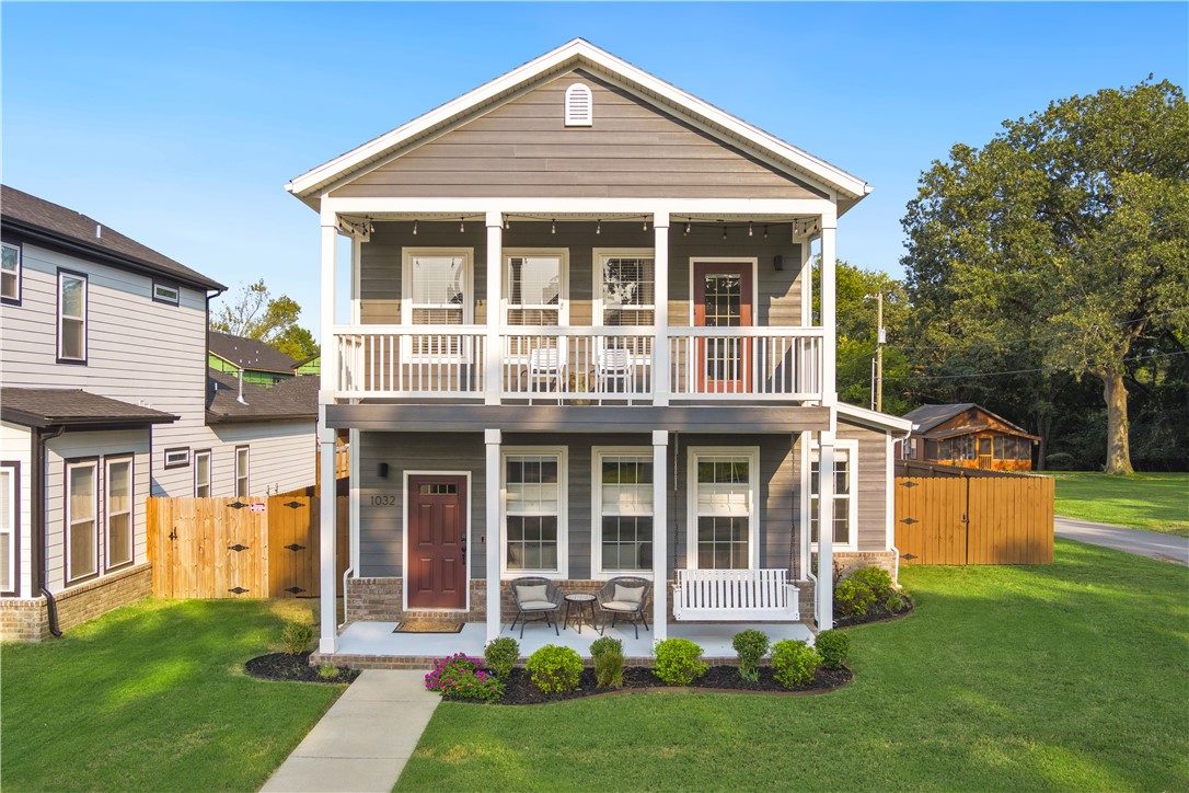 Experience the best of Downtown Bentonville in this stunning 2-level luxury home just 1 mile from Bentonville’s city square! Perfectly situated within walking/biking distance to Crystal Bridges, The Momentary, bike trails, 8th Street Market, trendy shops, and top-rated restaurants, this beautifully designed retreat offers the ultimate blend of comfort and convenience. Relax in the charming living area w/ fireplace and bookshelves. Enjoy cooking in the open kitchen featuring an island, stainless appliances, granite and pantry! Dining space walks out to a charming patio and large fenced yard great for kids and pets! Main level master suite offers a luxurious en suite bath and walk-in closet! Second level hosts a beautiful private suite that enjoys private access to the upper patio/balcony plus 2 additional bedrooms that share a full bath. Amazing investment potential in this top-rated short term rental! All furnishings including dishes, towels, household goods, etc are negotiable allowing an effortless transition!