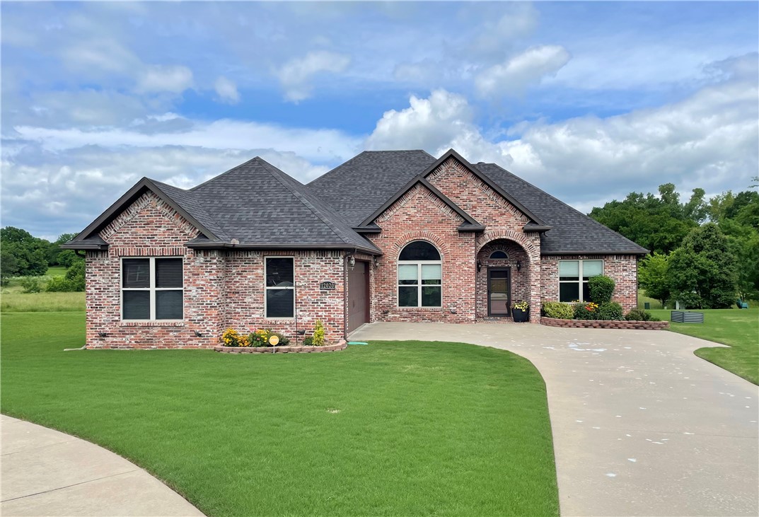 Step into this impeccably maintained home on a highly sought after cul-de-sac location with amazing views and privacy. Once inside you will find soaring ceilings and freshly updated finishes throughout. All the majors have been updated- HVAC/Furnace, 2024. Painting, 2024. Hot water heater, 2020. Roof, 2020. Appliances- 2017-2022 (all convey). Schedule today to see this one of a kind home boasting with charm and personality inside and out. This property showcases a commitment to quality and comfort and is a fabulous find in the heart of the Farmington/Prairie Grove area.