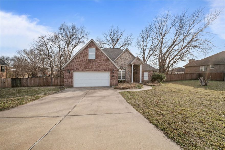 Welcome to 2603 SW 8th Street in Bentonville! This great home offers an unbeatable location just down the street from one of the Coler Creek trail access points, perfect for biking & enjoying the outdoors. You’ll also love the easy access to the current Walmart Home Office & the nearby Walmart Supercenter. The home features a flexible layout with three bedrooms downstairs & one bedroom upstairs, ideal for a guest suite, bonus room, or private office. Situated on a generous .43-acre lot, the backyard is truly amazing, with a covered deck & plenty of privacy, perfect for relaxing, entertaining, or simply enjoying the outdoors. Opportunities like this in such a prime Bentonville location don’t come along often!