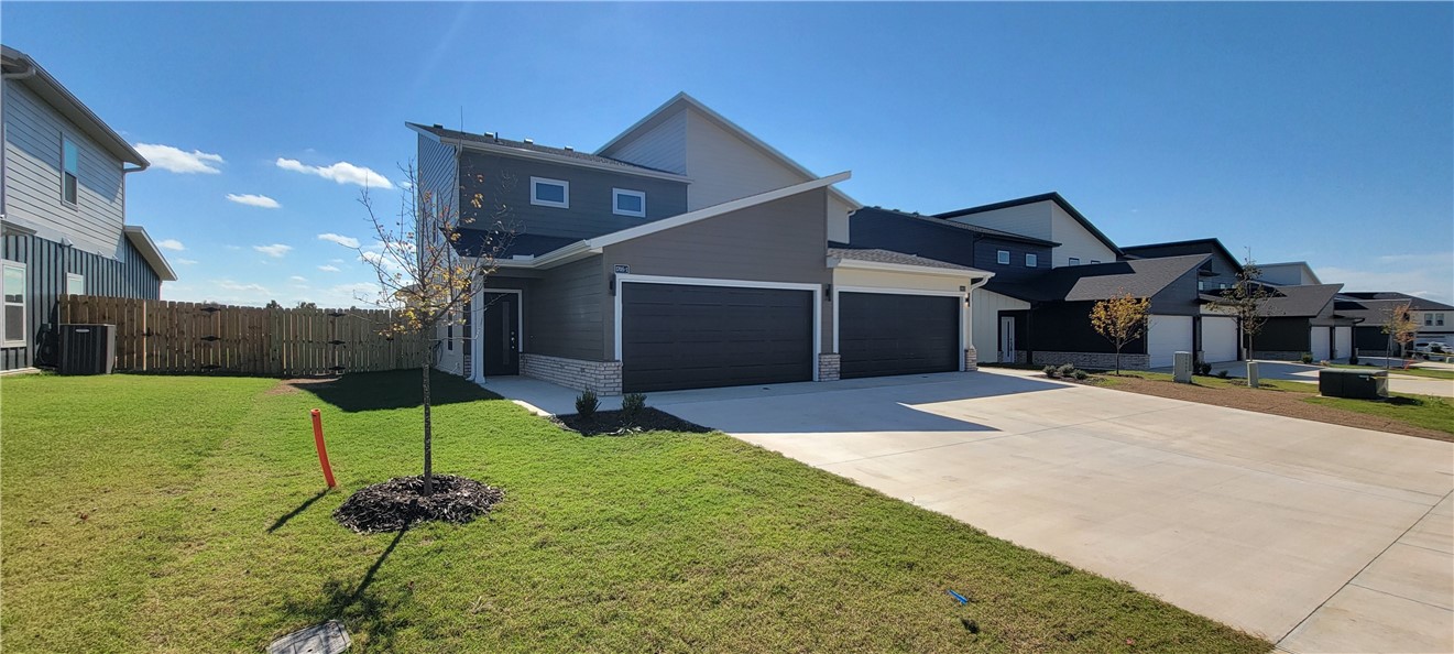 Newer modern design duplex in the heart of Bentonville! Also included brand new refrigerator, washer and dryer. This 3 bed 2 1/2 bath plan has quartz countertops, stainless appliances, and large pantry. Primary bedroom is on the main floor and has walk-in closest. Two bedrooms upstairs with full bath and walk-in closets. Luxury vinyl plank flooring throughout, 2" faux wood blinds, and upstairs study nook. You even have a private covered back patio and privacy fence. The property is within walking distance to Bentonville Creekside Park, it has a regulation size cricket field, pickleball courts, evening-lit dog park, splash pad, playground and recreation space with a group pavilion. You are also minutes from schools, Bentonville activity center, downtown Bentonville and all that Bentonville has to offer. Owner must approve pets and no smoking. $500 off your first month's rent if property rented by November 1st.