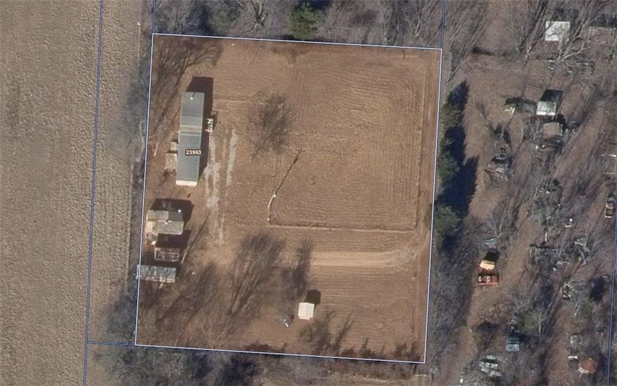 One acre of level land outside of the city limits awaits for you to make it your mini homestead or build your future home! It has a 14ft x 60ft,3 bedroom, 1 bath Mobile Home onsite. Some inside updates have been made and it's ready for the finishing touches. Window units in all the rooms. This could be your rental or your home. Call to schedule your showing today! (more pictures coming soon).