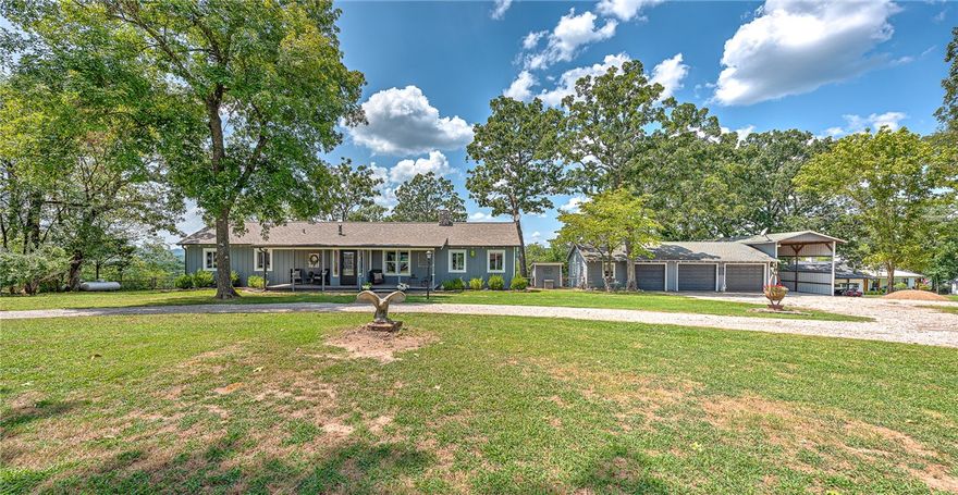 Perfection on the Kings River! Come home to your own piece of serenity with this lovely and meticulous ranch farmhouse. This property will make a great vacation getaway, family residence or even a short-term rental! Ample space with large and bright kitchen, living room and bedrooms, sunroom, screened in porch, firepit area and large deck, with all the views! A large detached 3 car garage with workshop and RV shed, for all your needs too. Freshly painted exterior and interior, with lovely wood floors and attention to detail, show off it’s stunning beauty. This sprawling 3.2 acre riverfront property includes a 400 sf caretaker’s home, currently being used as a long term rental. Sellers will consider selling furnished with acceptable offer. This is a true gem, close to shopping, restaurants and much more!