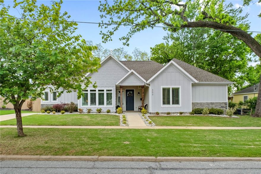 All things Downtown Bentonville covered with this beautiful 4-bedroom+office, 3 1/2 bath, Craftsman-style home! The home is split with a spacious 2800 sq ft open floor plan lower level and a 860 sq ft outside access 2nd level apartment, which the owners use as a revenue generating short-term rental. Lower level was created to incorporate the adult-style pool w/ outdoor cooking space, covered patio w/fireplace as an extension of the lower level of the home with the multi-slide Marvin doors. If you enjoy hosting friends, family and neighbors, this home is the ticket! Upstairs apartment is 1-bedroom, 1-bath w/ full kitchen that has never received less than a 5-star rating (E Street Escape) as a short-term rental. Shed behind the garage provides storage for guests visiting to explore Bentonville world class bike trails. Guests have easy walking access to all things Downtown Bentonville regardless if they're bikers or not. Downtown Bentonville gem!!