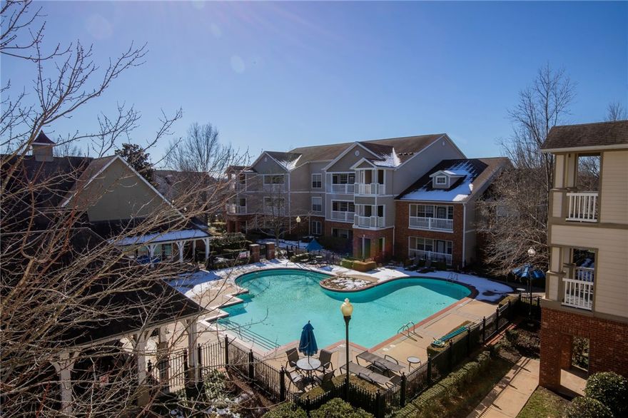 Wonderful condominium at the Reserve at Steele Crossing with a ONE CAR garage (rare for these units) The Reserve has all the amenities you want in a resort: Pool, workout facilities, dog park, and more. Walkable to Fayetteville's Uptown center with shopping, and restaurants and is right next to the NWA Mall. Love to ride bikes or use the trail system? It's right outside the entrance with a convenient trail head just to the east of the development. Inside is a great layout with open plan from kitchen tot he living room. You'll love having a balcony on the pool side as well!