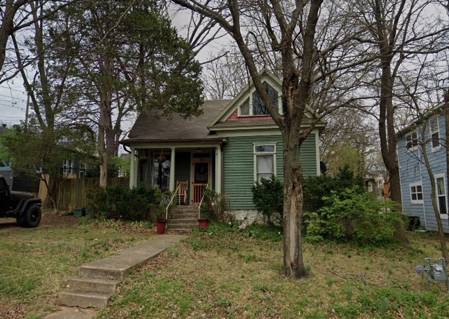 Entered for information purposes only. Sold prior to publishing. Unique home located near the University of Arkansas and walking distance to Fayetteville High School. Sellers added a spiral staircase to make the loft area more accessible. Large lot with ally access is perfect for splitting and adding additional housing in the back.