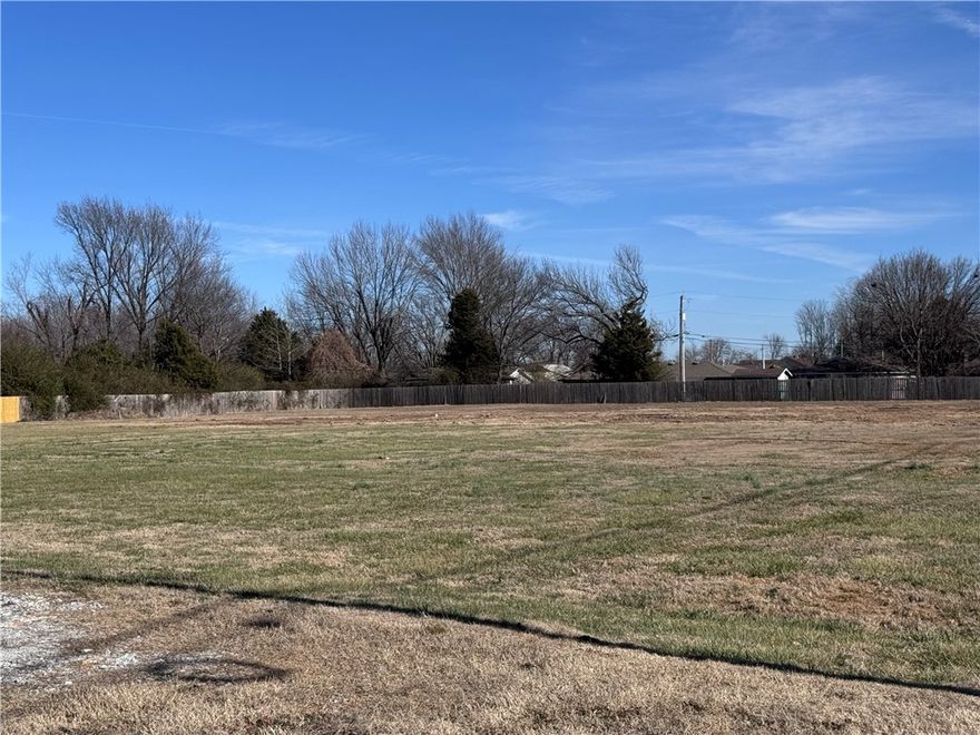 Situated in Siloam Springs, Arkansas, this 1.3 acres m/l offers an opportunity for those seeking a versatile, build ready tract.  The property is flat and clear with utilities already on site--providing a strong foundation for a variety of uses.  BUYER TO SATISFY ALL ZONING, USE AND DEVELOPMENT REQUIREMENTS.