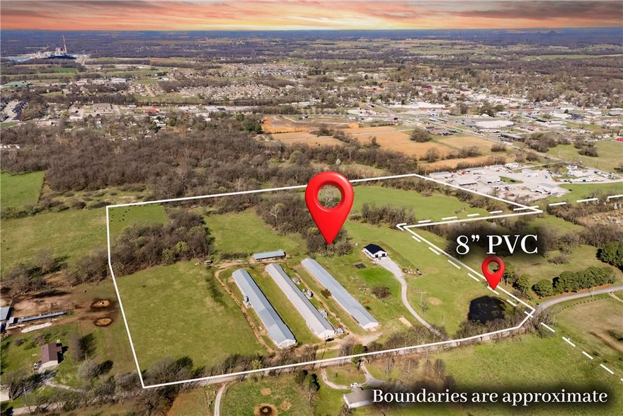 Outstanding opportunity for future residential development at 12041 Robin Road in Gentry. This property includes two parcels: 18-13588-004, zoned Agriculture, and 10-00011-001, zoned R-1. Parcel 10-00011-001 is located within the flood plain. An 8-inch PVC sewer line runs through the property. Positioned in a growing community with strong upside potential, this is a strategic opportunity for developers looking to secure ground ahead of expansion. Buyers to verify zoning, flood plain status, utilities, sewer capacity timelines, and development requirements with the City of Gentry.