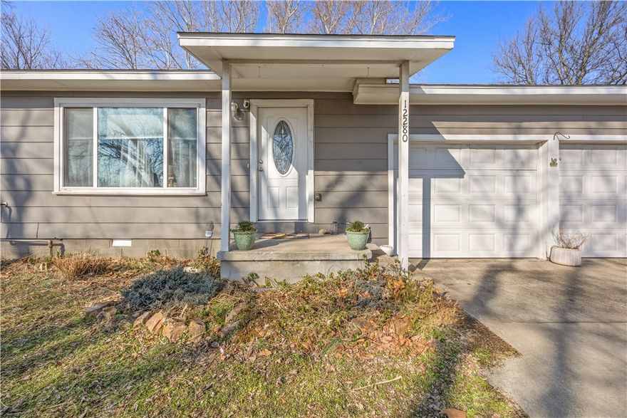 Located on Highway 62 in Farmington, this residential property offers excellent accessibility and convenience to shopping, dining, and everyday amenities. The home sits on a well-traveled corridor, providing easy access while maintaining residential use and function. With its prime location in a growing area, the property may offer potential for future rezoning or alternative use, subject to buyer verification with the City of Farmington. A great opportunity for homeowners or those looking to invest in a strategically positioned property. Schedule your showing today!