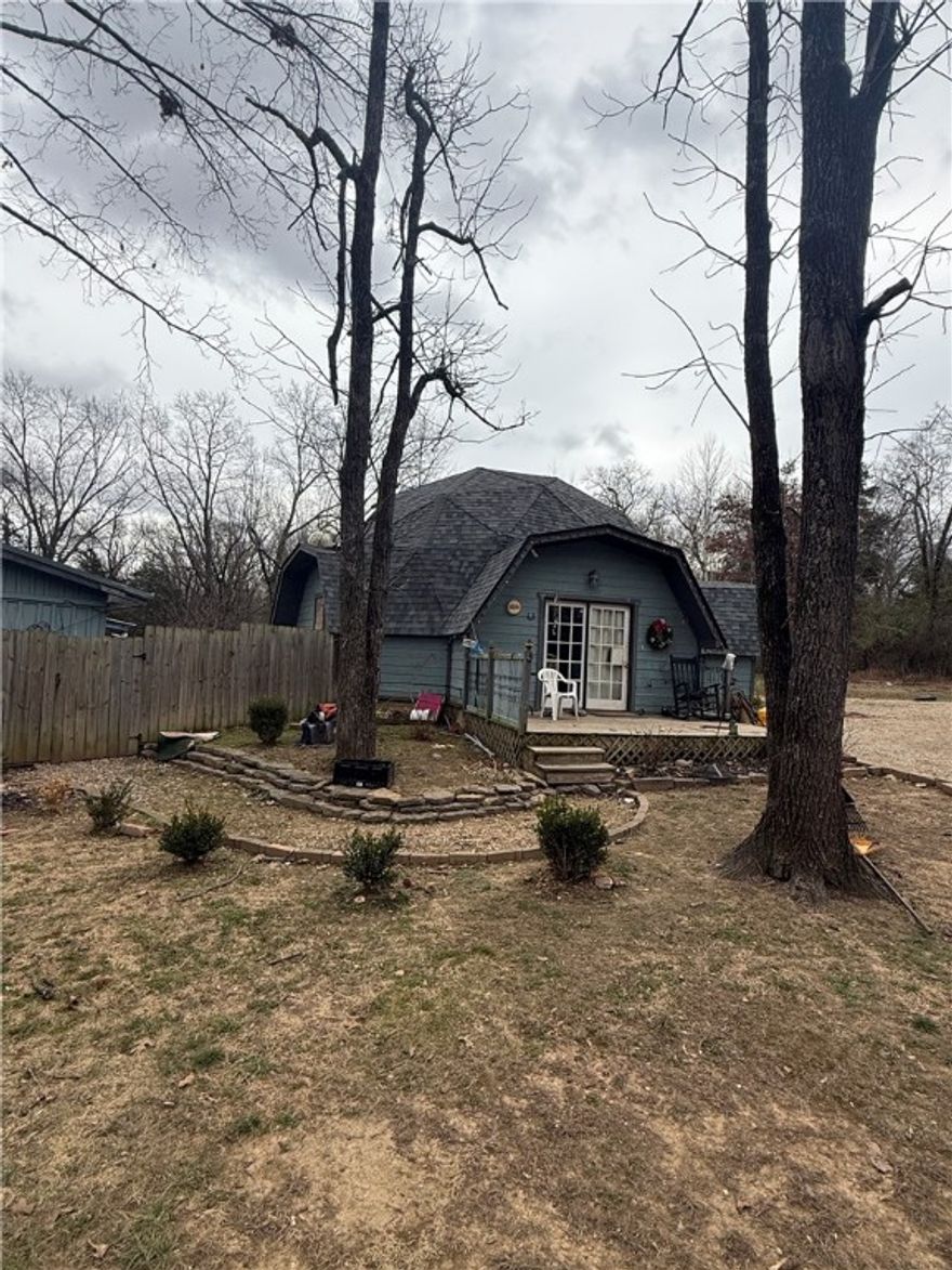 Unique dome-style home near the lake in Fayetteville’s 72703 area. Situated on a quiet lot, this property offers a distinctive layout and architectural character rarely found in the area. Conveniently located close to lake access, outdoor recreation, and northwest Fayetteville amenities. An excellent opportunity for investors or buyers looking for a non-traditional property with upside in a desirable location.