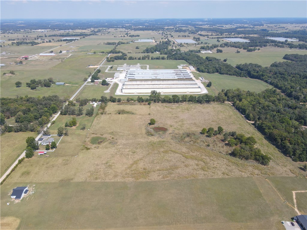 25.13 level acres with road frontage on Starr Road and Russell Road.Only minutes away from Gentry and Siloam Springs. Water is Accessible off Starr Road. Benton County Foods Commercial Eggs facility across the road.