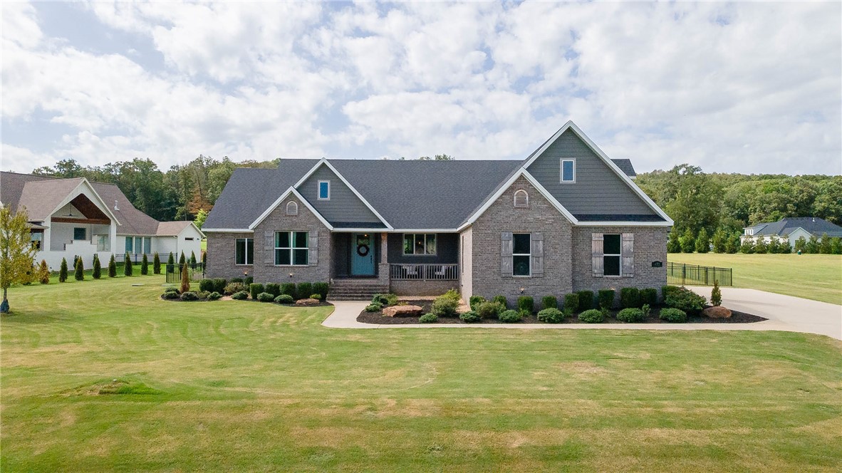 Welcome to this beautifully maintained, one-owner modern ranch in the desirable Knolls subdivision. Built just 5 years ago, this single-level home sits on a generous 0.75-acre lot and offers large front and back porches, perfect for relaxing or entertaining. Inside, youāll find soaring ceilings, a chefās kitchen with a striking 15-foot quartz serving bar with seating, and abundant attic storage. The primary suite features two walk-in closets for added convenience. The Front Yard and Landscape has irrigation as well as a portion of the backyard.
The Knolls offers fantastic neighborhood amenities, including a pool and pool house, tennis and pickleball courts, and scenic walking trails. With its clean, contemporary design and thoughtful layout, this home combines comfort, space, and styleāall in one.