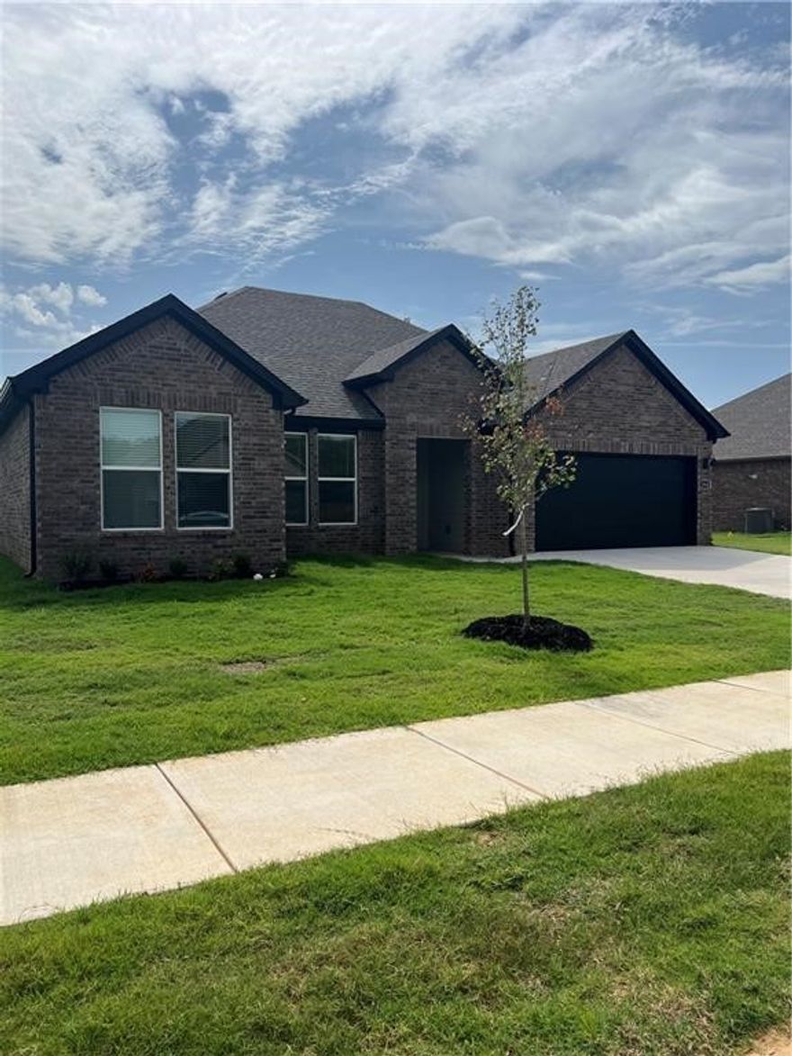Perfectly positioned near the world-renowned Crystal Bridges Museum of American Art, scenic mountain biking trails, and some of the area’s most celebrated dining destinations, this location blends lifestyle and convenience seamlessly. Each newly constructed home is thoughtfully designed with high-end finishes and modern style. The chef-inspired kitchen features sleek quartz countertops, a designer tile backsplash, and stainless-steel appliances—perfectly complemented by durable luxury vinyl plank flooring that flows throughout the main living spaces. The inviting living room centers around a contemporary electric fireplace with a heater and wood mantle, creating a warm yet refined focal point. Retreat to the spacious primary suite, where the spa-like bathroom offers quartz countertops, dual sinks, and an oversized ceramic-tiled walk-in shower—designed for both comfort and elegance.