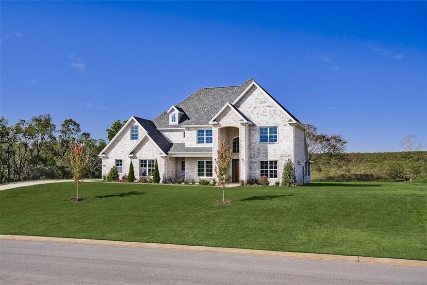 Impressive estate home on a perfectly flat 1 acre lot in gated West End by JSN. Sizable study with barn door entry & brick accent wall. Dining boasts gorgeous coffered ceiling. Living offers exposed beams, brick fireplace & picture windows. Custom cabinets, subway tile back-splash, wood vent hood & ceiling accents in the kitchen. Outdoor access, shiplap ceiling inlay & huge walk-in closet in the master. Bonus room with mini bar. Covered porch equipped with fireplace, grill, and outdoor bathroom.