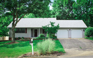 Tastefully remodeled 2 story energy efficient home in the beautiful Robinwood II Subdivision. The living room cathedral ceiling opens all the way to the upstairs living area balcony. The newly remodeled staircase features white on oak. Large kitchen and dining area. Master suite and laundry located on main level. Virtual 3-D at https://my.matterport.com/show/?m=YYGNcWXasZFGreat enclosed sun porch leading to an outdoor covered patio and an elevated freshly stained deck. Very private back yard with lots of shade and area for pets and play. Put a firepit or garden shed on the existing concrete slab between the trees. Big garage with an area to put a small workshop or storage. New carpet, freshly painted inside and out. New roof.