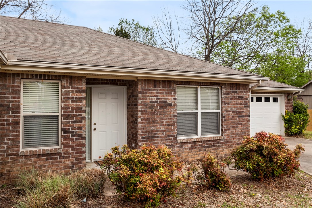 Well kept 2 bedroom, 2 bath, 1250 SF duplex near Fullbright & Hwy 71B/College. Features gas fireplace in spacious living room, hardwood floors, tile in wet areas and privacy fenced backyard with deck. Close to grocery stores and Fayetteville trails. No pets. Agent owned.