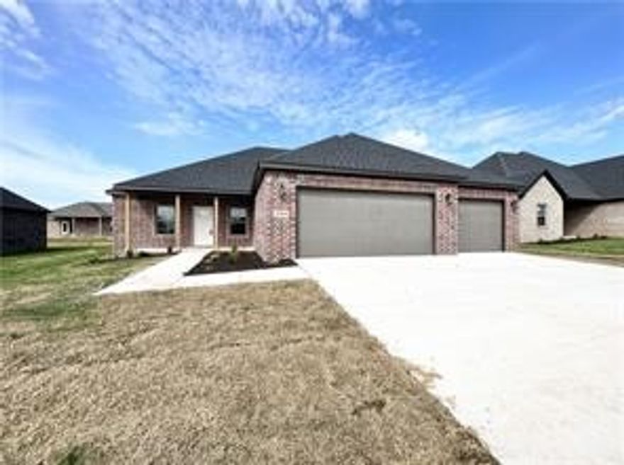 Conveniently located close to the Pea Ridge High School, trails, and only 15 minutes to downtown Bentonville. The "Williams" plan features a wood privacy fence, 4BDs, 2.5BA's, modern quartz counters, custom cabinets w/ wood hood above gas range, large island, covered patio, and a 3 car garage! Full sod + landscaping package. *Pictures may not be of exact Unit available*