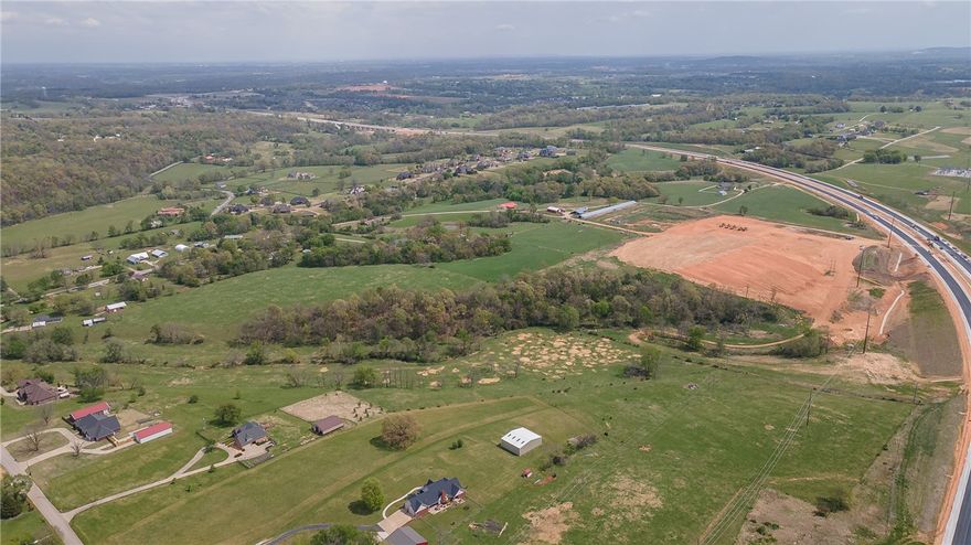 Hard to find 10.95 acres +/- in Tontitown located close to everything. Property has a 3000 sq ft shop. 

Sold before print.