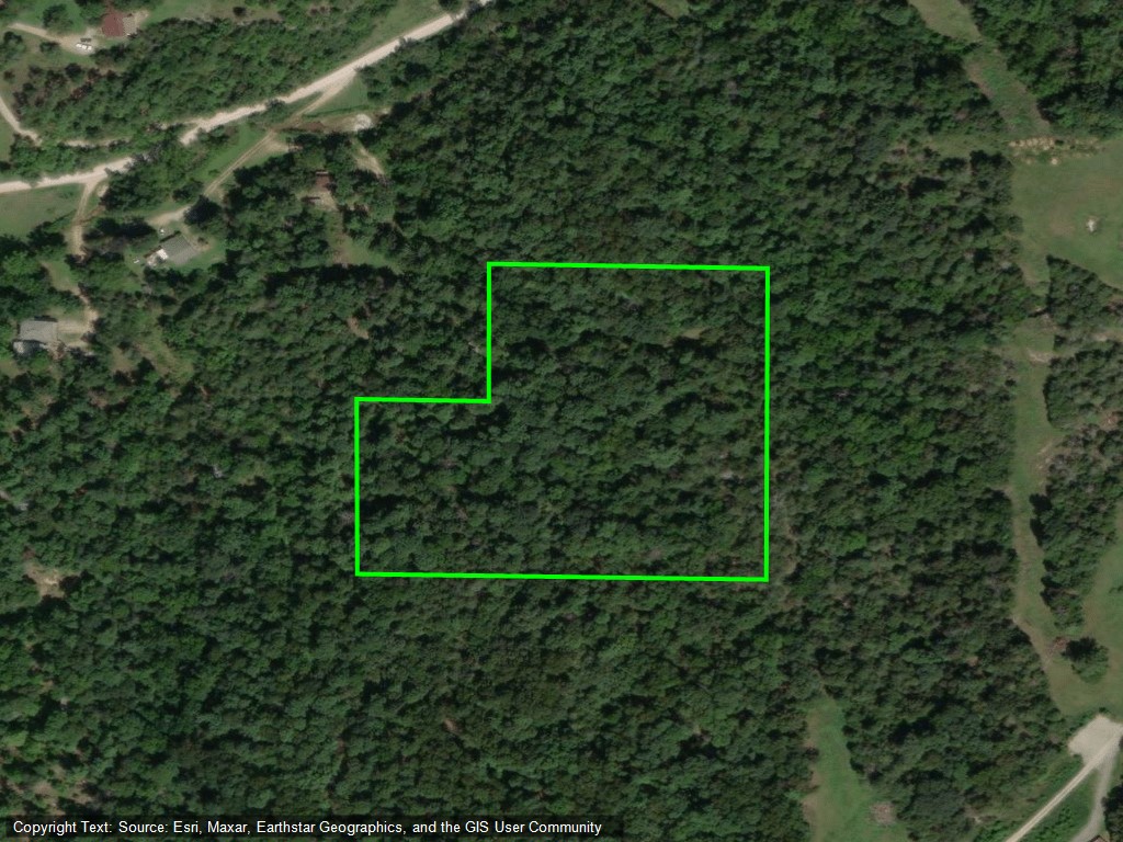 Land behind three homes...no road to property presently.