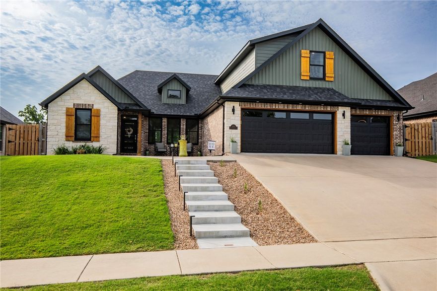 Now offered at $775,000, this Contemporary Craftsman combines thoughtful design with impressive upgrades. Entertain in style from the expansive 487 sq ft 4-season screened patio (2024)—perfect for gatherings year-round. The chef’s kitchen features quartz counters, Bosch double ovens, pot filler, microwave, and walk-in pantry, plus abundant storage with soft-close cabinetry throughout. Main level includes 3 bedrooms + 2 baths, while upstairs offers a full in-law/multi-generational suite and a bonus media room. Recent improvements include owned solar panels (2023), new roof (Aug 2024), Anderson windows (2024), and insulated garage doors (2024). Car enthusiasts will love the epoxy-finished 3-car garage with extra storage. Smart landscaping with LED lighting, artificial pet turf, and terraced garden beds complete this home—just minutes from trail access, parks, and top Bentonville schools.