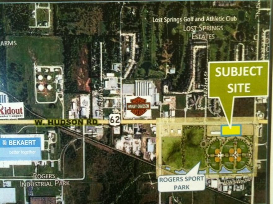 Prime 3 acre commercial lot !  483 ft of frontage & a traffic count of 30,000+ !  Excellent location with great exposure for your business !  Located next to Casey's General Store & the new Rogers Sports Park, & just a short distance east of I-49, Sam's Club HQ, Walmart IT, the future site of Walmart HO HQ, NWACC, Crystal Bridges & more!