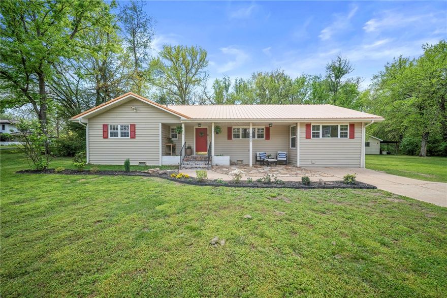 Welcome to 600 W University Street! This spacious, move-in ready home right in the heart of downtown Siloam Springs features dual master suites, two living rooms, original hardwood floors, wood burning fireplace, and newer metal roof (installed 2021). The property has a large 1.07 acre yard with mature trees, raised garden beds, patio for entertaining, plus a 288 square foot storage shed that could be used for an ADU (additional living unit). Located just one street away from Sager Creek and Bob Henry park, you will enjoy pickleball courts, walking trails, dog park and skate park, plus shopping and restaurants within walking distance, and JBU campus just up the street.