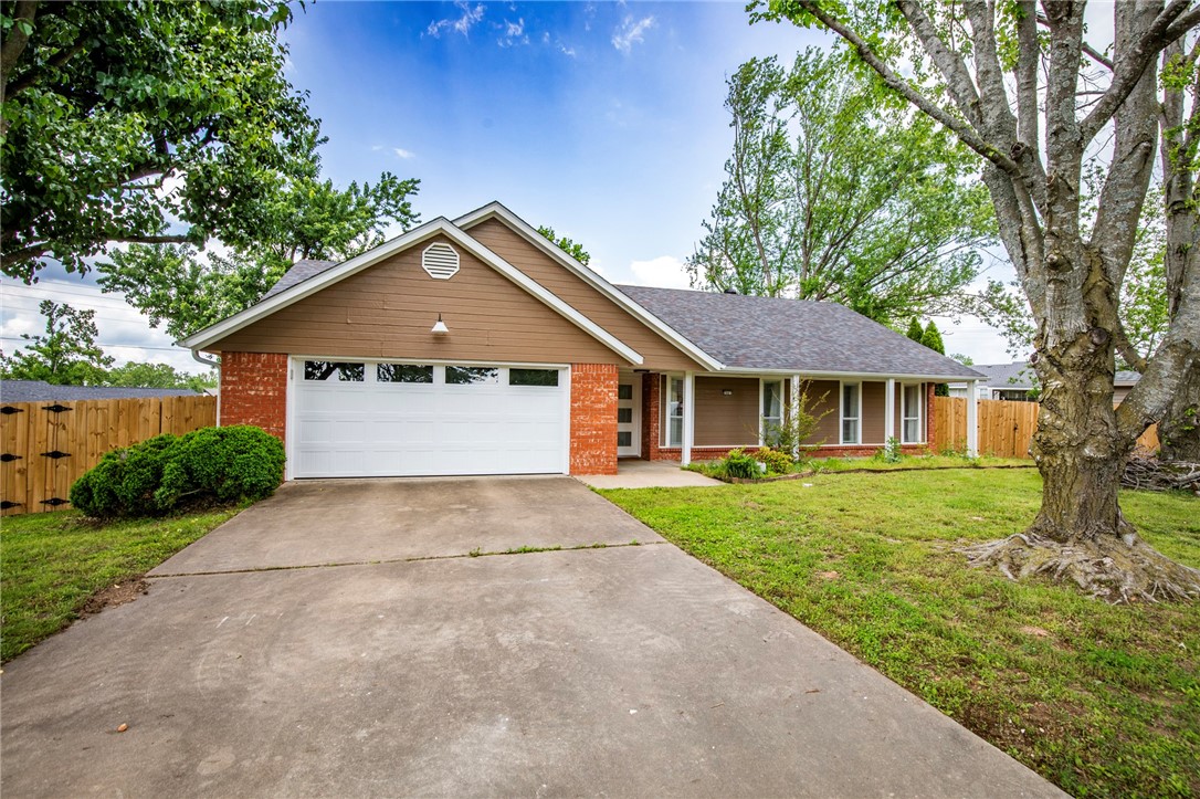 This STUNNING home has been meticulously updated with modern, yet warm finishes that are cozy and
welcoming. Sitting on a generous sized lot, this 3 Bedroom 2 Bathroom home is near the Rogers Aquatic
Center, close to I-49, Downtown Rogers, Shopping, & Restaurants. Gorgeous stone floor entry, vaulted
ceiling in the Living Room w/ open concept.The Kitchen has been transformed w/ new cabinets,
countertops, lighting, sink, backsplash, & fixtures w/ Smart Refrigerator, Induction Stovetop w/
Hoodvent, Dual Microwave/Oven Combo. The Dining has a custom Built-In w/ a 51 bottle dual zone wine
fridge. Large Primary Bedroom & 2 other Bedrooms, all with Walk-In Closets. Hall bathroom has a Pottery
Barn vanity, Limewash walls, & custom tile tub/shower combo. Primary Bathroom has Custom Tile Walk-In shower & Pottery Barn Vanity. The backyard has plenty of space for all of
your outdoor activities. A full list of the upgrades & features available.