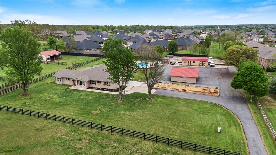 Location! In-ground Pool! Acreage! Privacy, but centrally located! This is an amazing property and rare listing in the area! This home has endless possibilities. Zoned Agriculture, this nearly 5 acre property includes a 4 bedroom, 4 bath home (inside is remodeled and custom upgrades), Chef's kitchen, large primary room and bath, tall ceilings in the living room, Tons of storage throughout, Pole Barn with horse stalls, additional sheds on property, granite counters, 3 water heaters, huge pantry, built in office space, handicap accessible, No carpet, mop room, Horse/Dog run, Fully fenced,Bonus space with kitchenette, and SO much more! Just down from the newest park/sport park, Darr Elementary, Walmart Amp, Top Golf, and Cross Creek Subdivision. This home and land have multiple possibilities to fit your custom needs! Make a showing today!